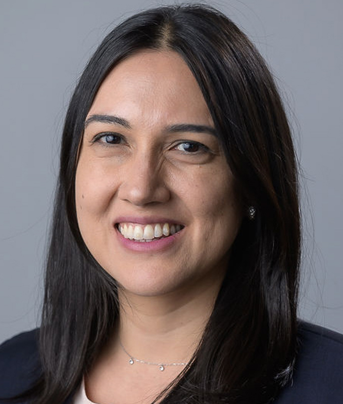 A photograph of Sandra Corredor.